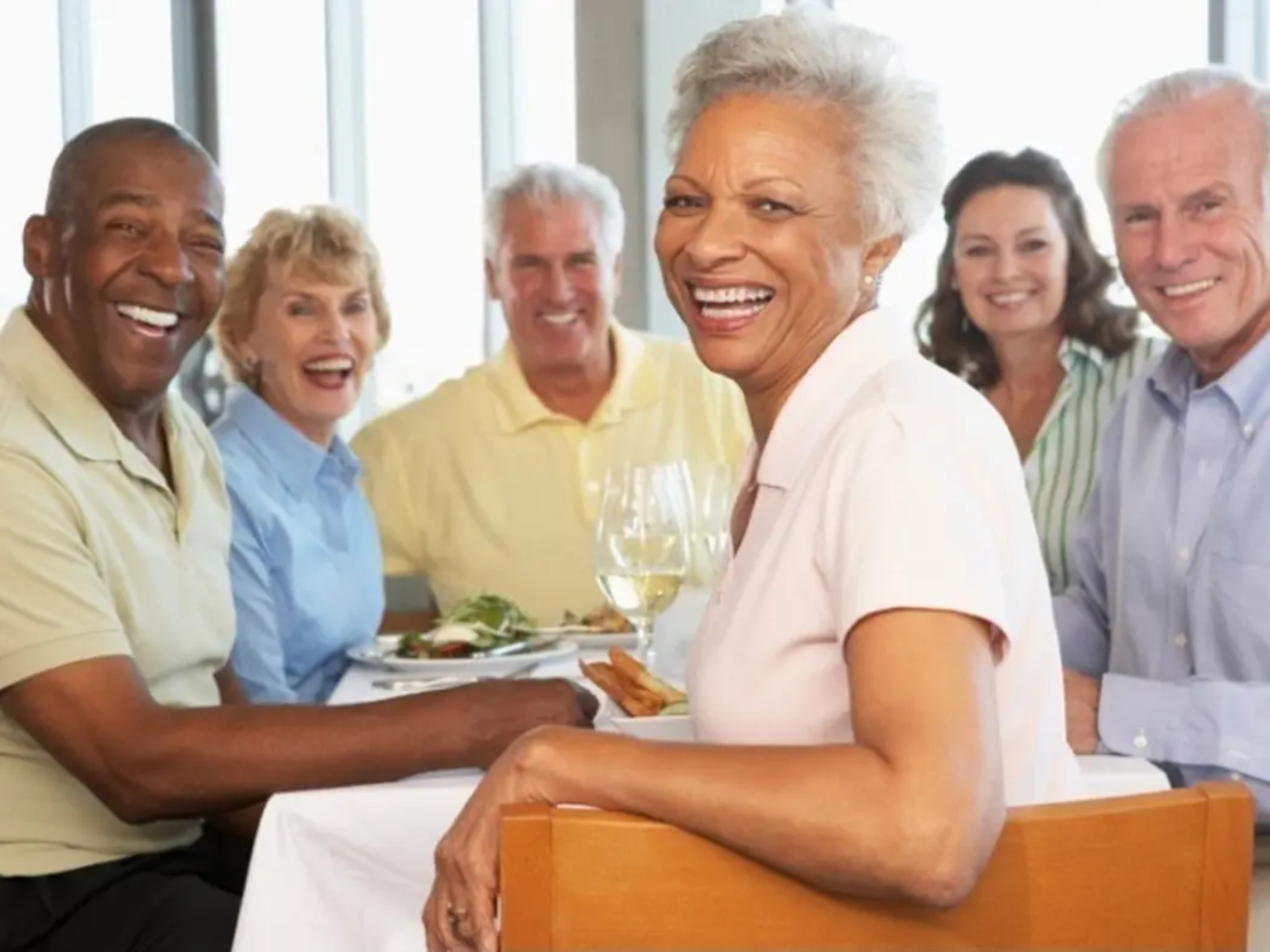 seniors sitting at table
