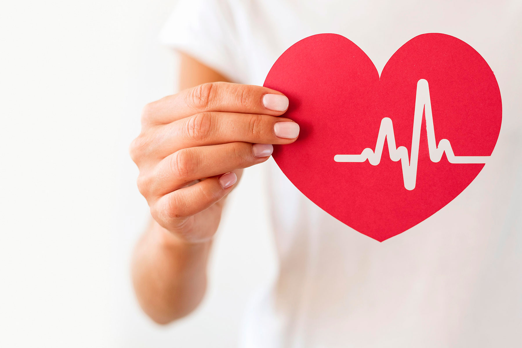 man holding heart cutout